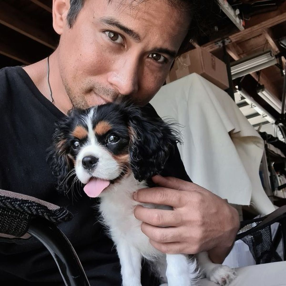 Sam Milby clicking selfie while holding his cute dog, Bailey